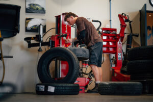 Tyre being changed in the tyre bay