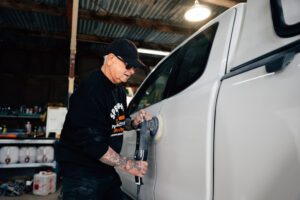 Technician working on a white work van