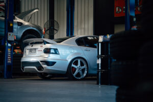 Car on the hoist for a WOF and service